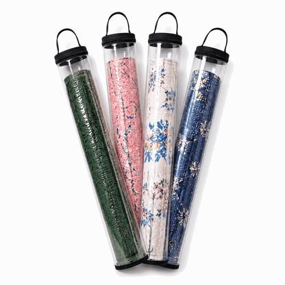 Four clear PVC mahjong mat storage bags with black trim and rolled floral mats