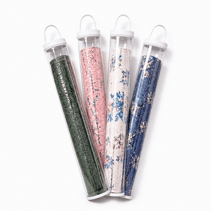 Four clear PVC mahjong mat storage bags with white trim holding rolled floral mats