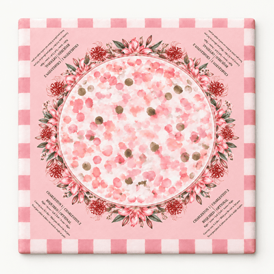 Square pink mahjong mat with a circular floral wreath, scattered blossoms, and a pink checkered border, displayed against white.