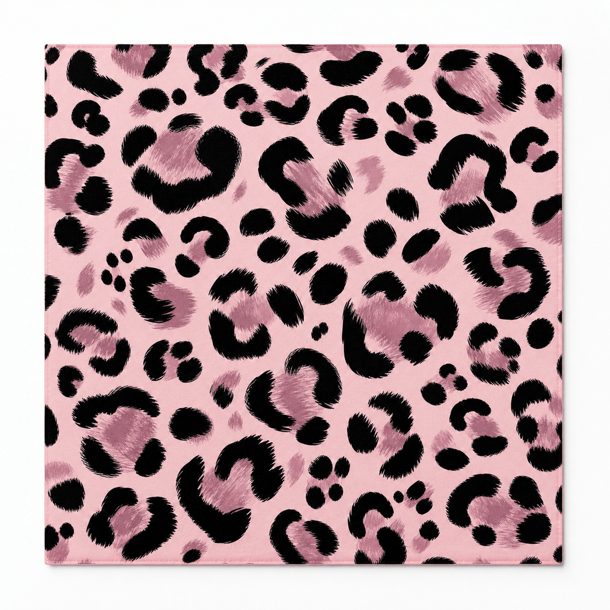 Square mahjong mat covered in bold black and dark pink leopard spots on a light pink background.